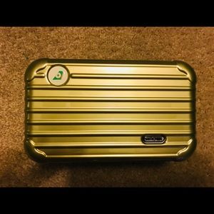 Rimowa travel bag. Eva air metallic light green